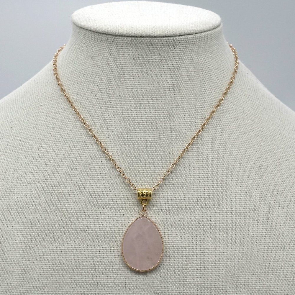 Genuine Rose Quartz stone with link chain.
